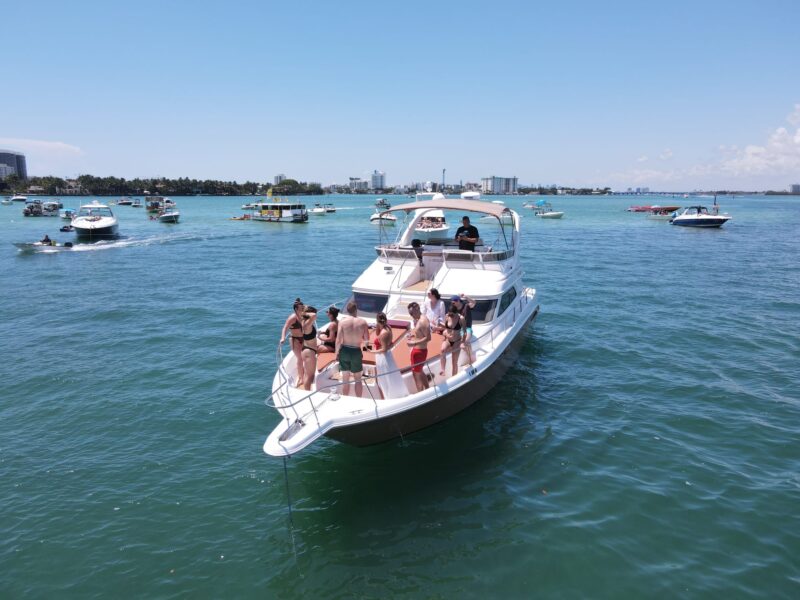 50Ft Flybridge Mundomo II available in Miami for Rent for up to 13 Guest, PLUS ONE JET SKI FOR AN HR. - Image 2