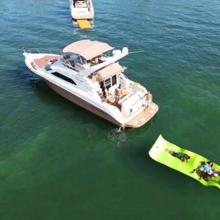 50Ft Flybridge Mundomo II available in Miami for Rent for up to 13 Guest, PLUS ONE JET SKI FOR AN HR.